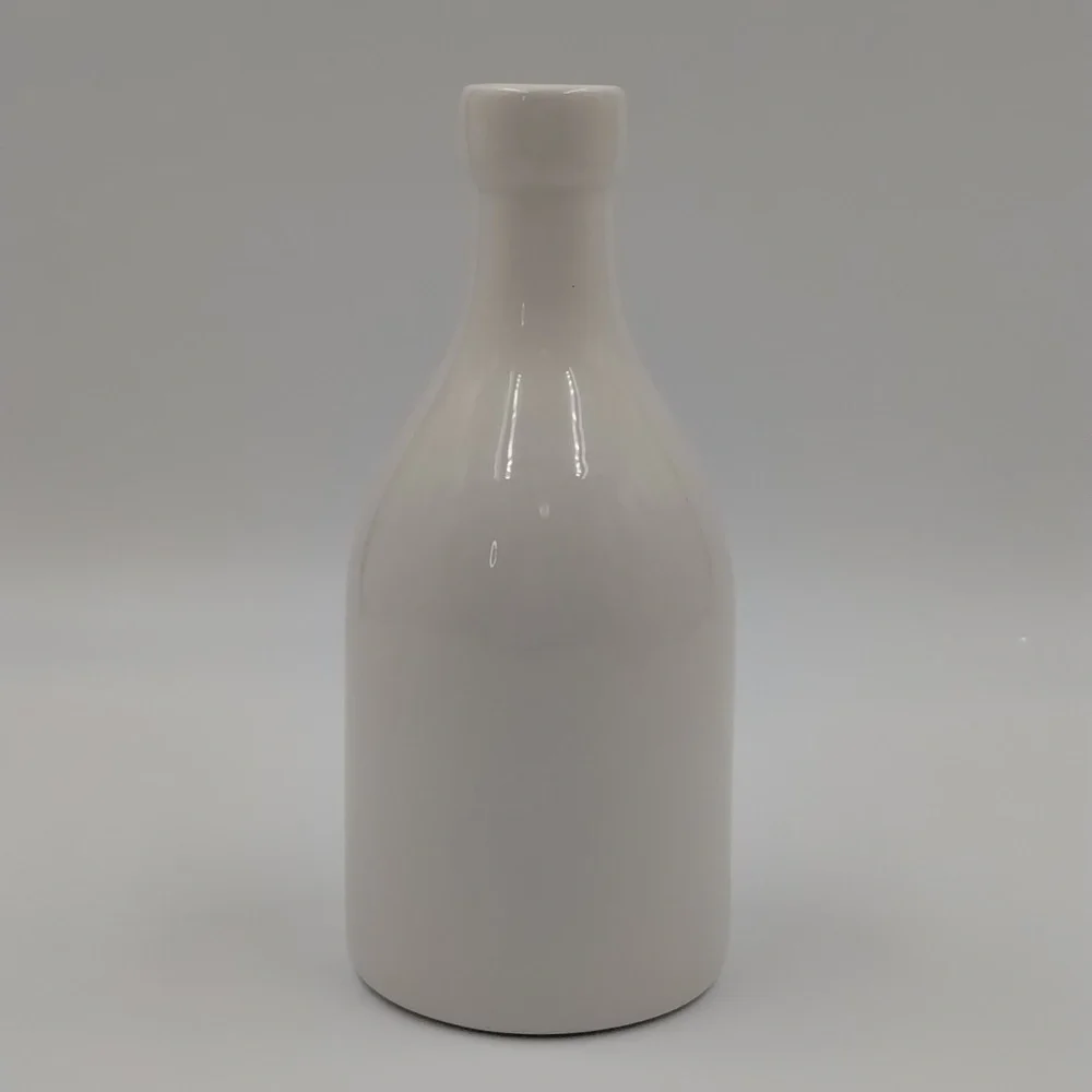 Orly Maison Oil 12 ounce ceramic container